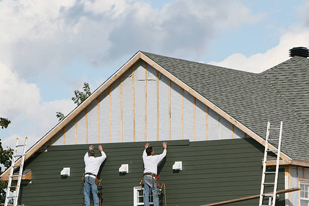 Professional Siding Replacement technician working in Oyster Bay, NY